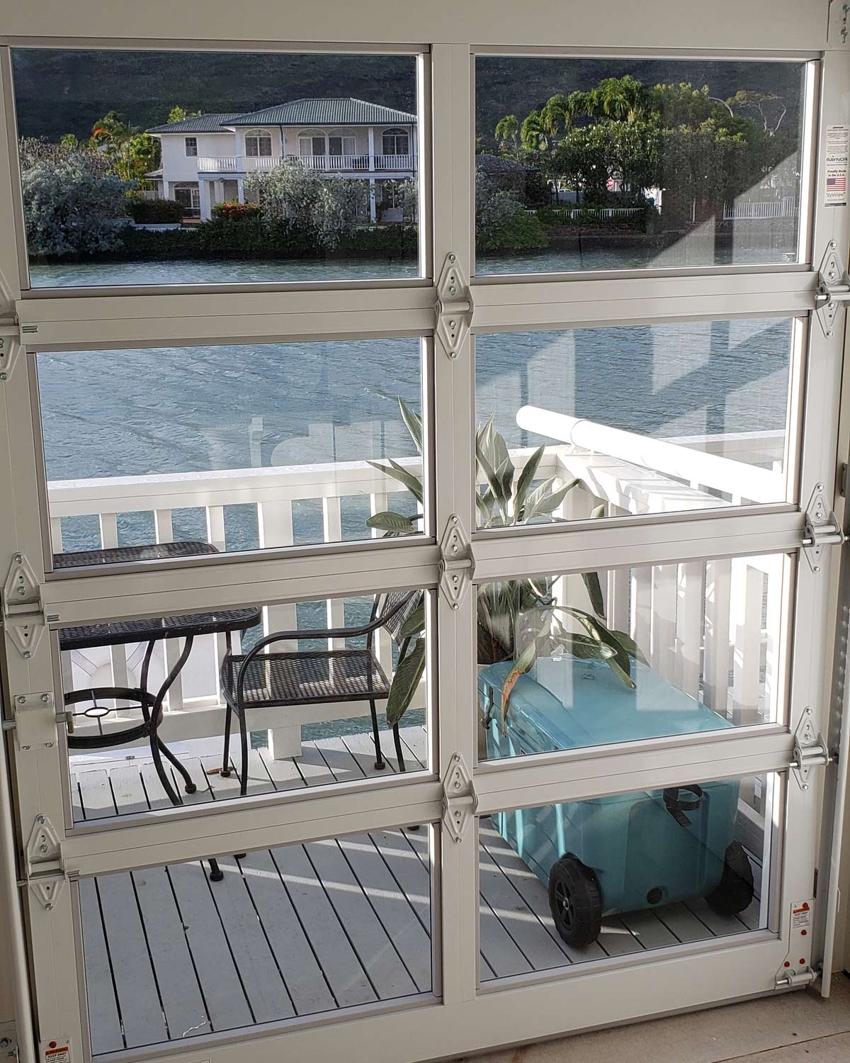 image of aluminum raynor door on enclosed porch in Honolulu